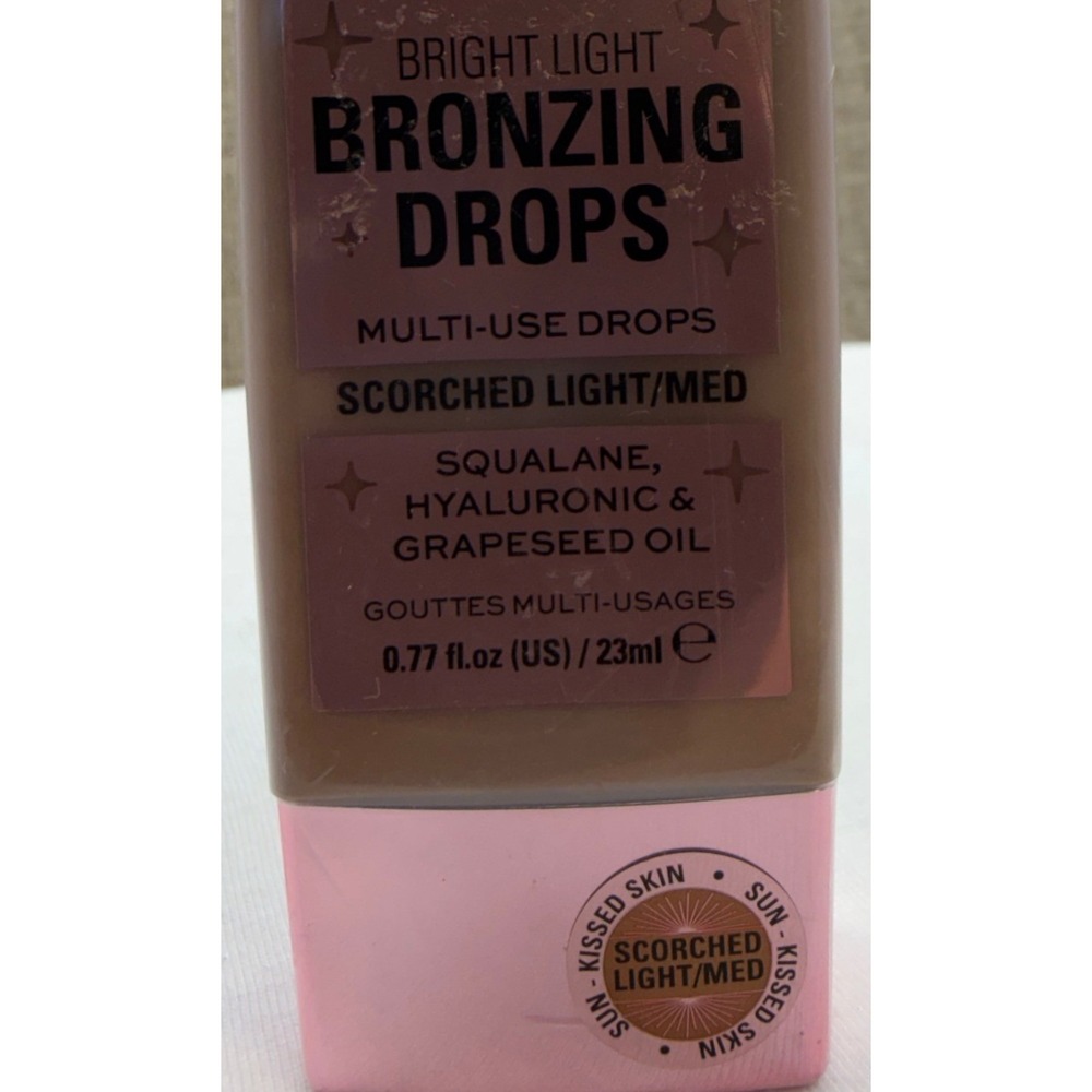 Revolution Beauty Bright Light Bronzing Drops Scorched Light/Med 0.77oz Vegan